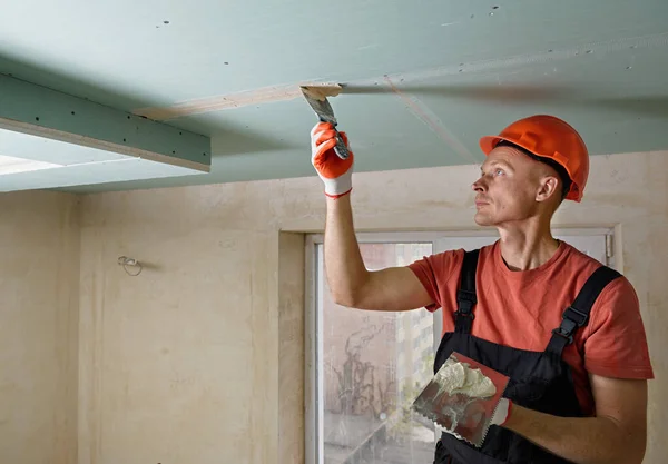 Filling the seams plasterboards. — Stock Photo, Image