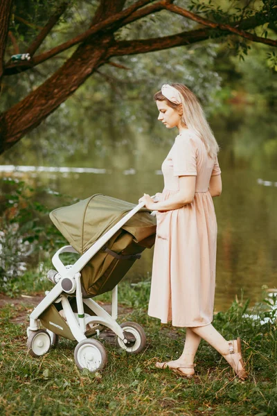 Happy Young Mother Baby Buggy Walking Park — Stock Photo, Image