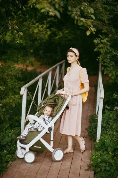 Happy Young Mother Baby Buggy Walking Park — Stock Photo, Image