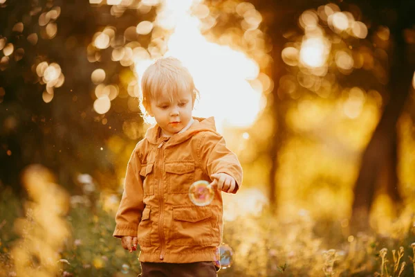 Cute Baby Boy Walking Beige Jacket Sunset Autumn Day — Stock Photo, Image