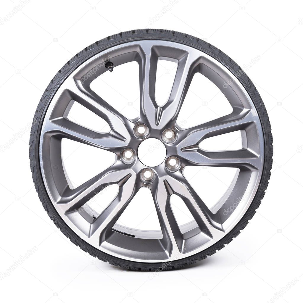 car alloy wheel on white background