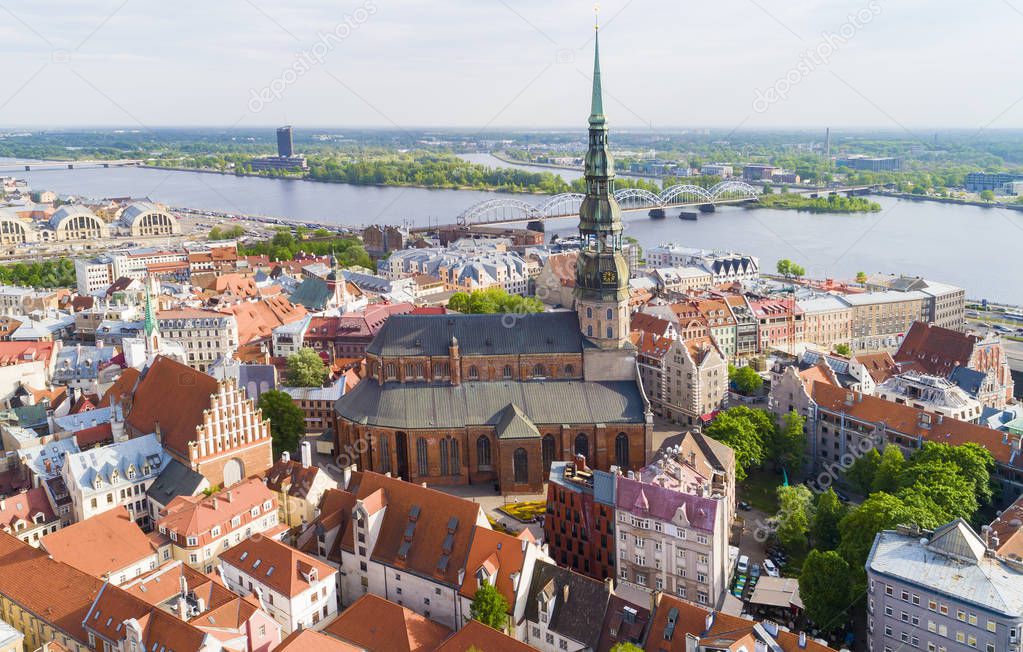 Beautiful aerial Riga view from above. View on the St. Peters cathedral during sunny da