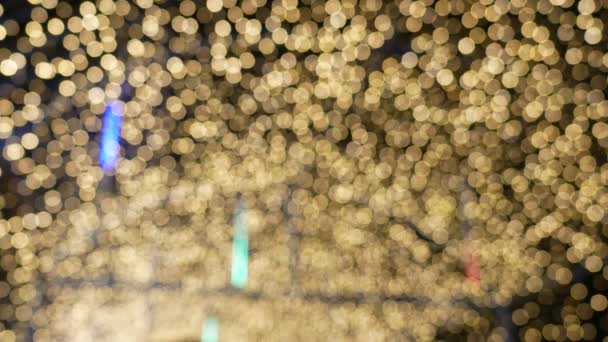 模糊黄色金色散景光弥散背景和纹理为圣诞节 新年假期党和庆祝背景 — 图库视频影像