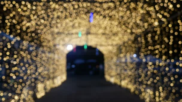 Tunnel Blurred Yellow Golden Bokeh Light Defocused Background Textured Christmas — Stock Video