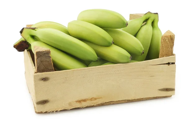 Pequeno Lanche Verde Bananas Uma Caixa Madeira Fundo Branco — Fotografia de Stock