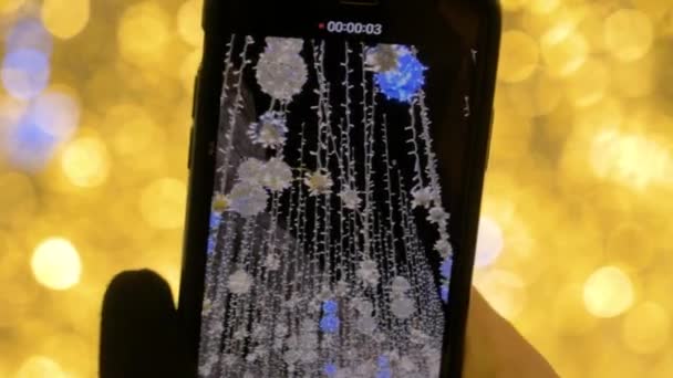 Figyelembe a videó a Smartphone karácsonyi Illuminations — Stock videók