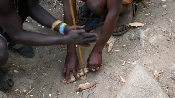 Arusha, Tanzania - 29 January 2019: Make A Friction Fire By Rubbing Sticks — Stock Video