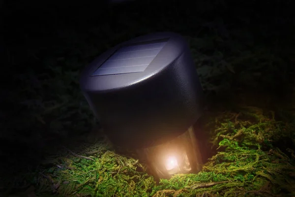 Solar powered flashlight on the background of nature. — Stock Photo, Image
