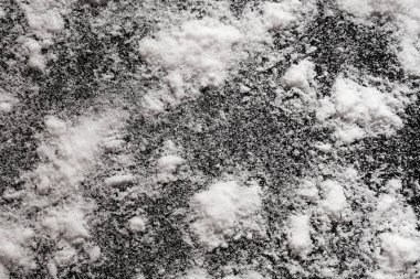 Siyah arka planda beyaz toz. Için yalıtılmış soyut desen 