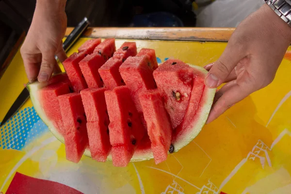 Sliced water melon served desert. Close up of cut watermelon hol