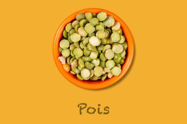 Aynı renk arka planda bezelye (Fransızca metin) ile besin maddeleri ile turuncu kase