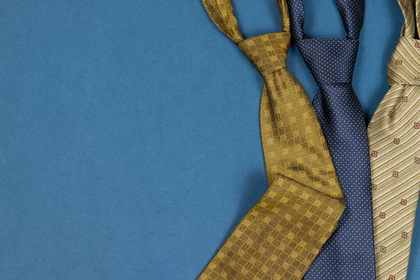 Three Ties Blue Background Copy Space — Stock Photo, Image