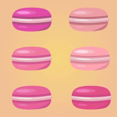 Pembe arka planda renkli suluboya macaroons. Yemek düz