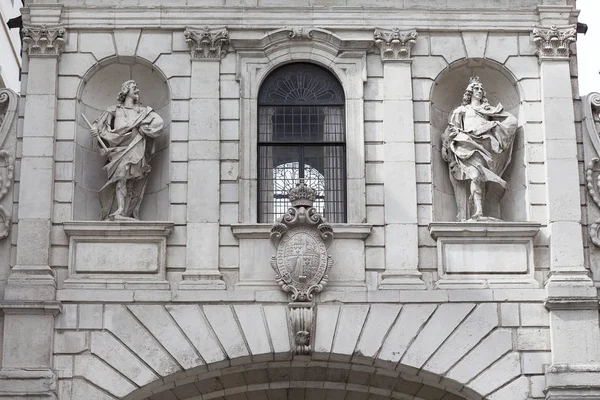 Stone decorative gate near St Paul Cathedral, London, United Kingdom.