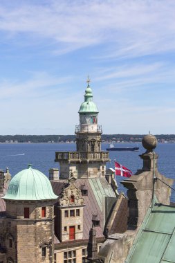 Medieval Kronborg Castle on the Oresund Strait, view on towers and Baltic Sea,  Helsingor, Denmark clipart
