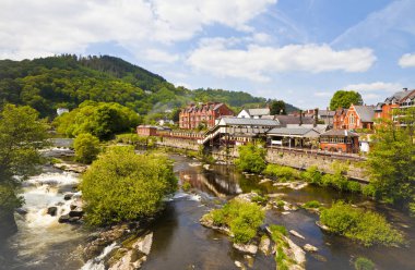 Llangollen railway station and the river Dee in Wale clipart