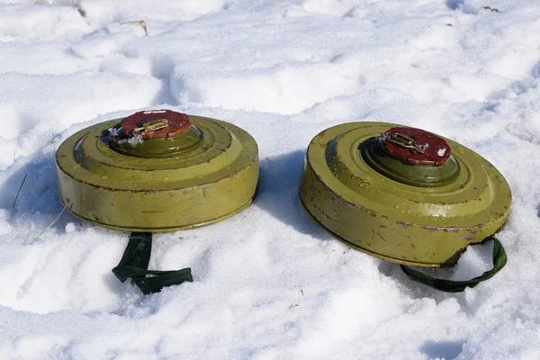 Anti-tank mines on snow — Stock Photo, Image