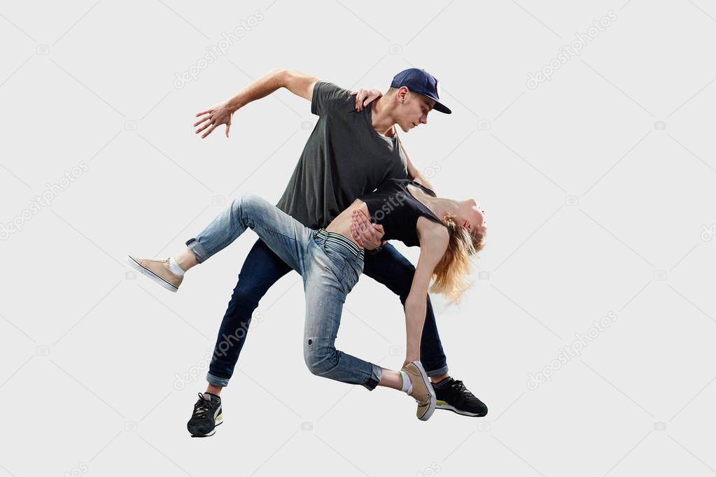 Isolated Hip Hop Dancers. Beautiful couple passionately dancing on white background