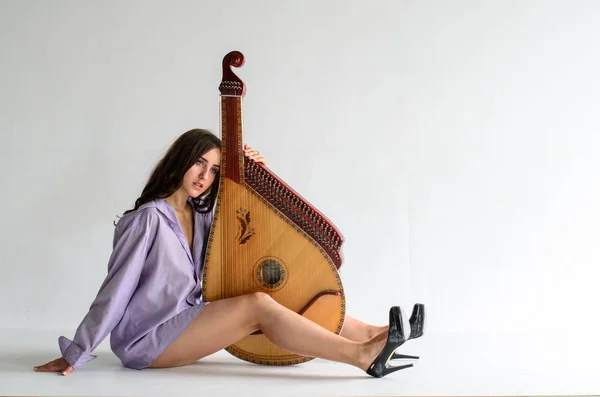 girl woman bandura musical instrument.