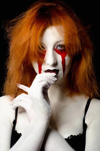 Gyönyörű fiatal nő, mint a szexi vámpír halloween portré — Stock Fotó