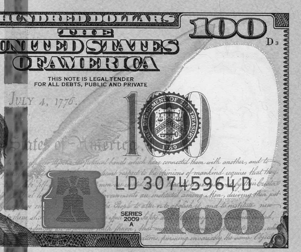 Montón de billetes de cien dólares de primer plano —  Fotos de Stock