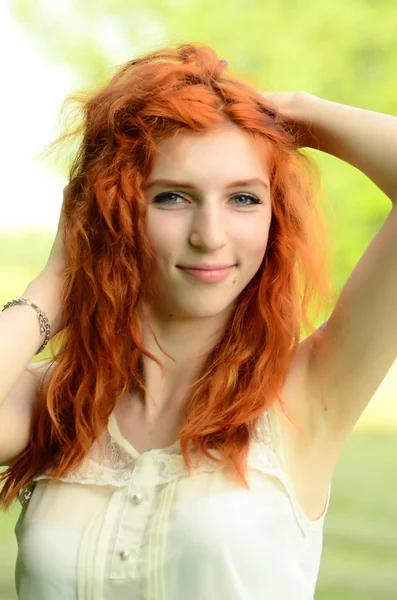 A young beautiful ore girl of the Caucasian appearance is having fun with pineapple. Place for text.Vegan, vegetarianism, healthy lifestyle, positive concept — Stock Photo, Image