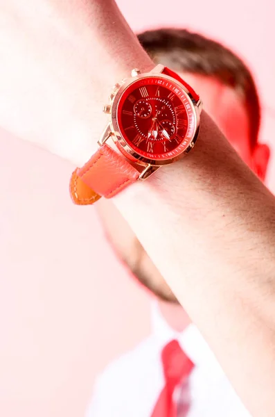 Businessman checking time from watch — Stock Photo, Image