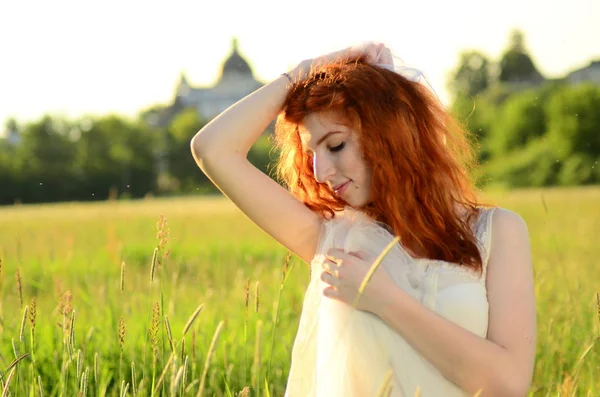 A young beautiful ore girl of the Caucasian appearance is having fun with pineapple. Place for text.Vegan, vegetarianism, healthy lifestyle, positive concept — Stock Photo, Image