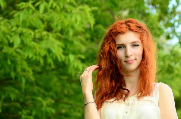 A young beautiful ore girl of the Caucasian appearance is having fun with pineapple. Place for text.Vegan, vegetarianism, healthy lifestyle, positive concept — Stock Photo, Image