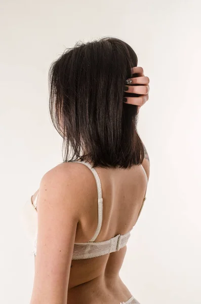 Junge schöne Mädchen nackt isoliert auf einem schwarzen Hintergrund — Stockfoto