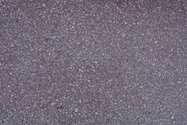 Doğal taş kırmızı granit doku arka plan. Parlak sabit kırmızı granit doku. Kırmızı granit doku taş arka plan. Kırmızı granit doku tedavi edilmezse yüzey. Malzeme yatay arka plan karşı karşıya.