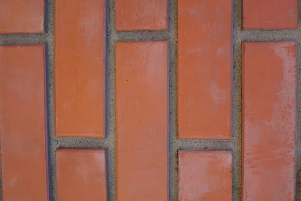Tegelvägg av röd färg, brett panorama av murverk — Stockfoto