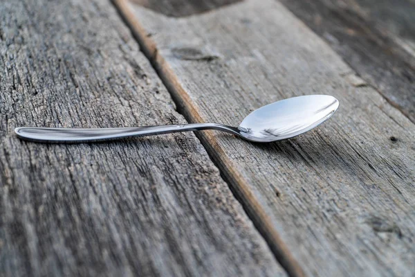 Knife and fork on wooden background. Cutlery on wooden. — Stock Photo, Image