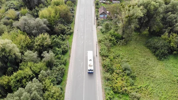 Aerial view of a trolleybus, aerial view, drone shooting from top to bottom. — Stok fotoğraf