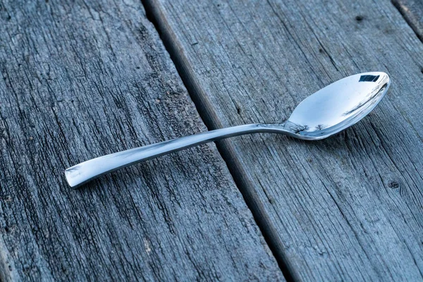 Knife and fork on wooden background. Cutlery on wooden. — Stock Photo, Image