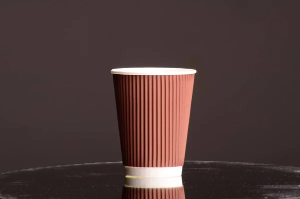 Paper coffee cup in coffee shop. — Stock Photo, Image