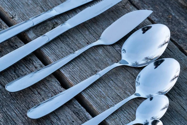 Knife and fork on wooden background. Cutlery on wooden. — Stock Photo, Image