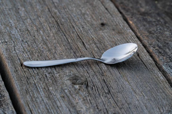 Knife and fork on wooden background. Cutlery on wooden. — Stock Photo, Image