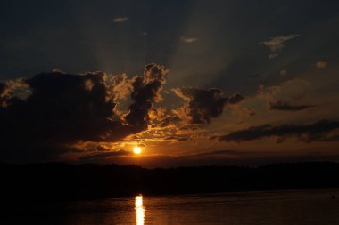 picturesque view of endless sea with beautiful sunrise at sky 