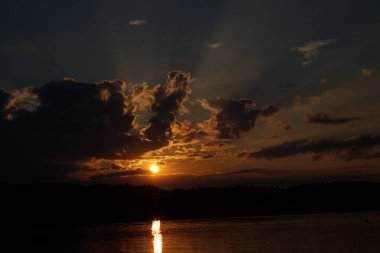 picturesque view of endless sea with beautiful sunrise at sky 