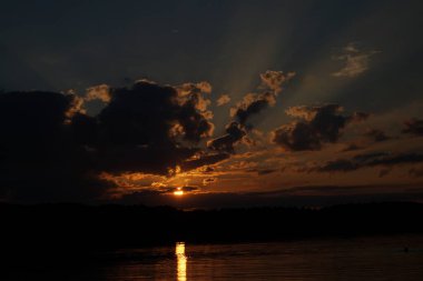 picturesque view of endless sea with beautiful sunrise at sky 