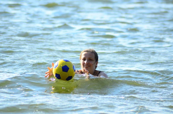 Young Woman Playing Ball Summer Lake — Zdjęcie stockowe