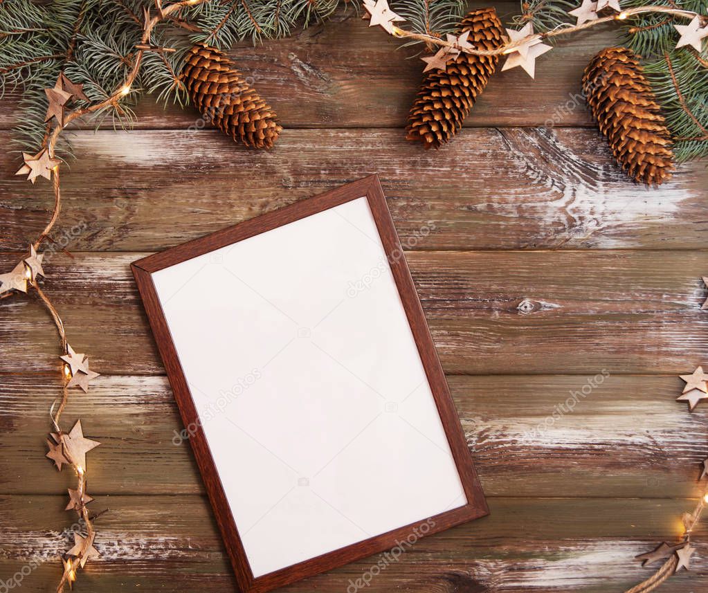 Wooden frame on christmas background.
