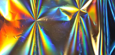 Bulanık holografik folyo dokusu.