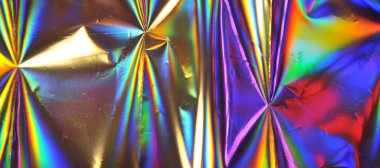 Bulanık holografik folyo dokusu.