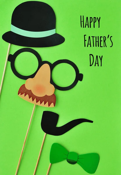 Paper photo props on colorful background. Father`s Day concept.