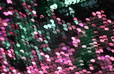 Renkli payetler pırıl pırıl arka plan.