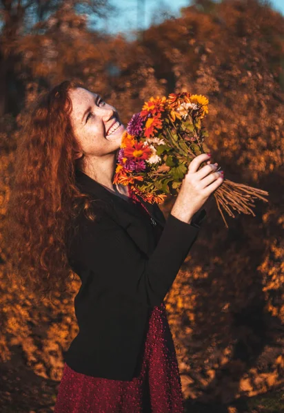 Red Haired Woman Flowers Hands Outdoors — Stock Photo, Image