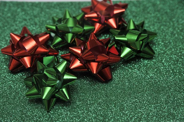 Ünnepi Színes Íjak Csillogó Csillogó Papír Textúra Nyaralási Háttér Karácsonyi — Stock Fotó
