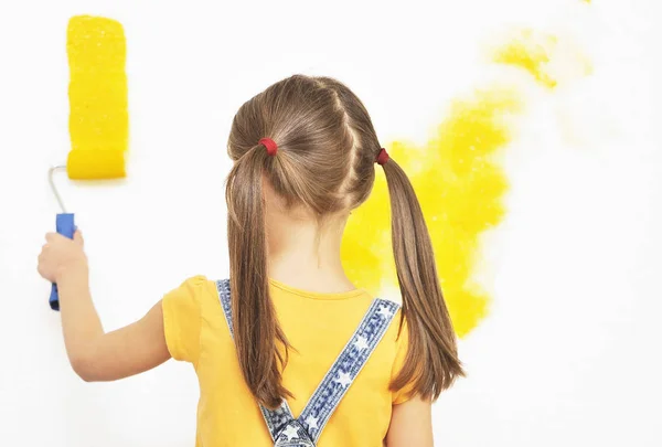 Cute Girl Paint Roller Hands Paints Wall Royalty Free Stock Photos